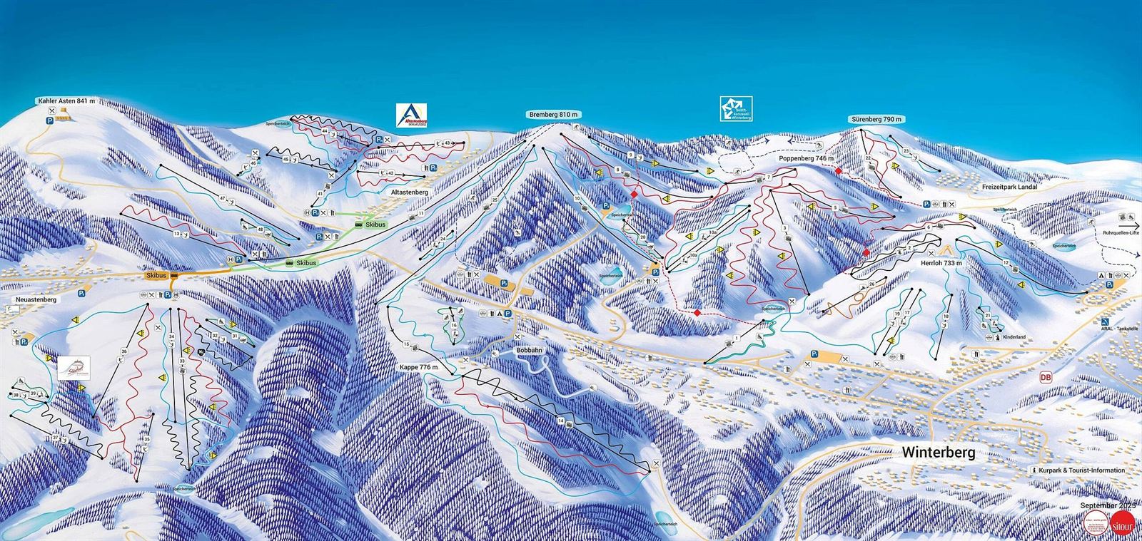 Skiërs op de piste bij Winterberg